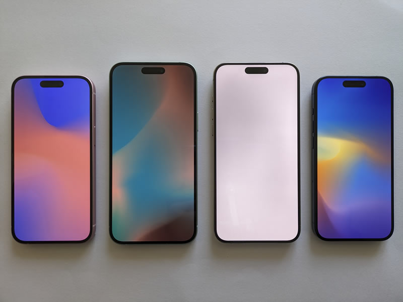 Modern touchscreen smartphones illustrating how mobile phones have become thinner and lighter than early brick phones